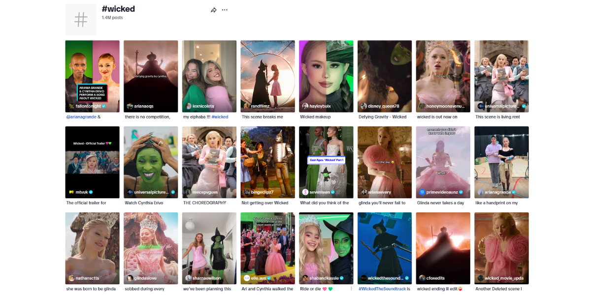 A screenshot taken from TikTok displaying the 'wicked' hashtag. In the image is states '1.4 million posts' as well as several user-generated videos underneath alongside brands such as FallonTonight, MTV, Universal, and Ariana Grande herself.